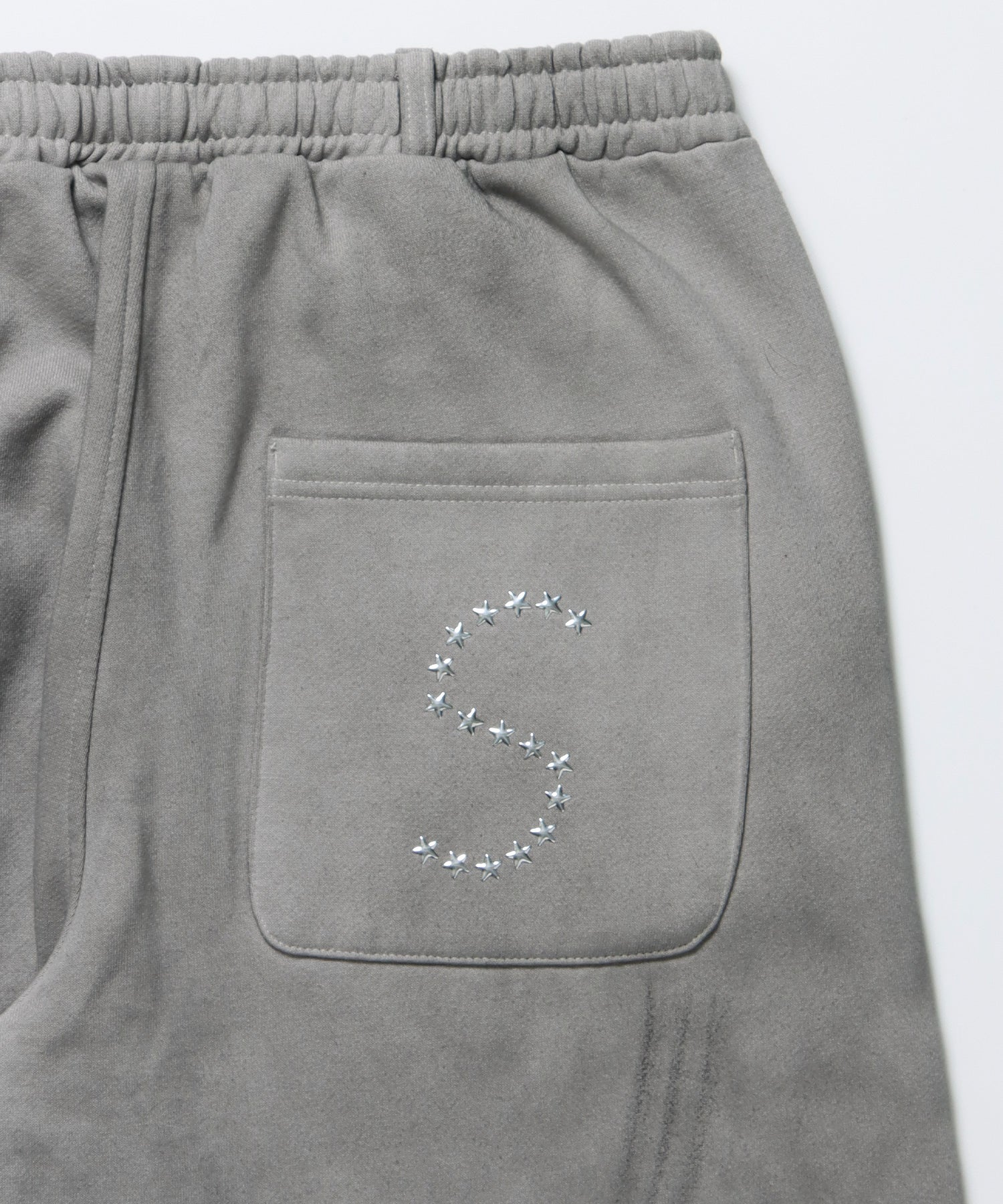 sqnz fade sweat pants / スウェット パンツ 加工 ハトメ スタッズ 裏起毛≪SET UP着用可能≫ ライトグレー
