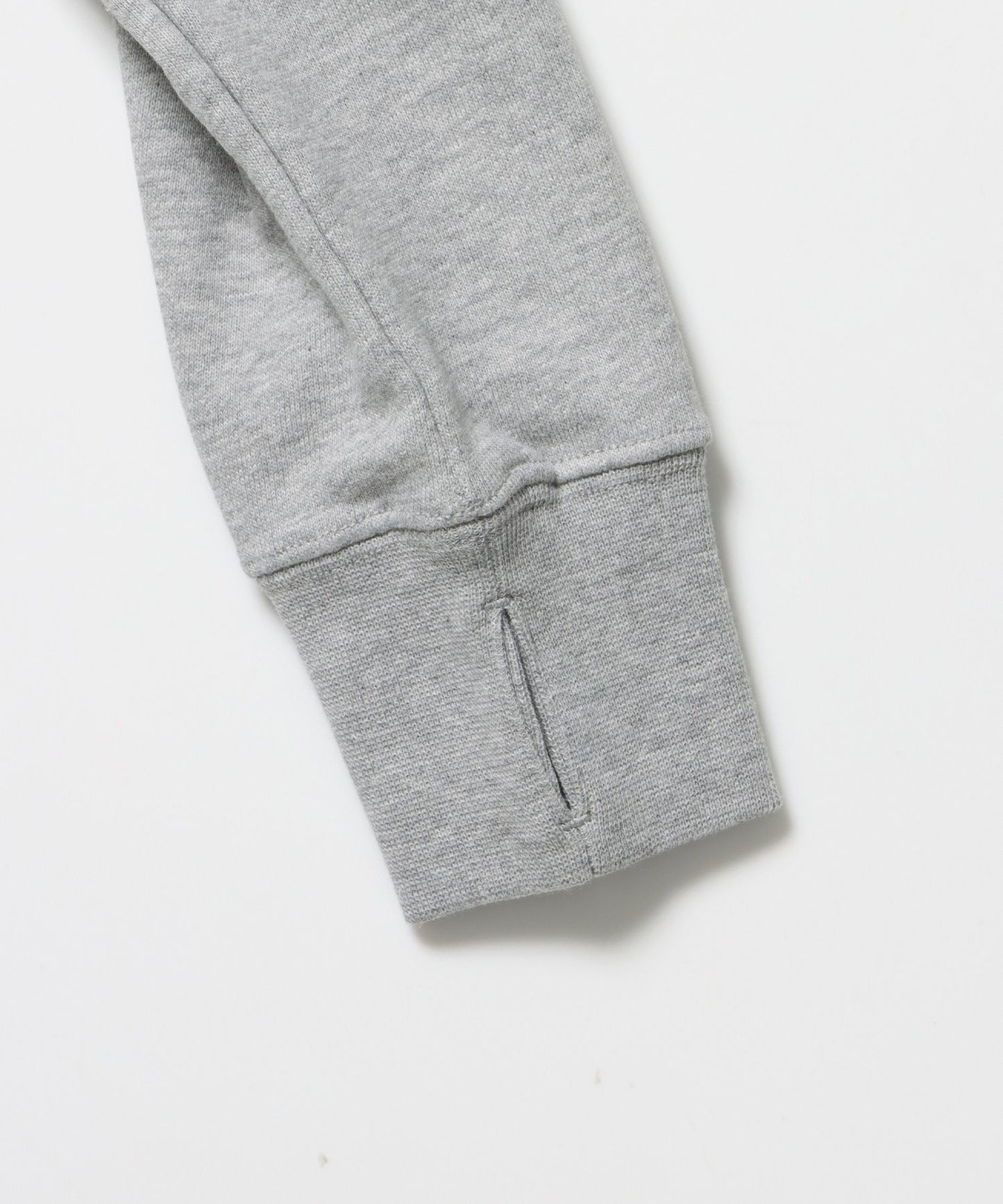 sqnz off shoulder zip p/k / オフショルダー ダブルジップ スウェット 裏毛 ワンポイント サムホール プリント グレー