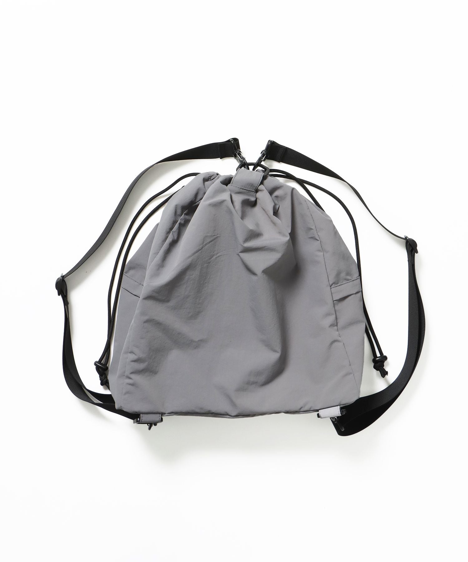 【sqnz(エスキュンズ)】sqnz 2way knapsack / ユニセックス ナップサック リュック 雑貨 バック 2WAY ドローコード グレー