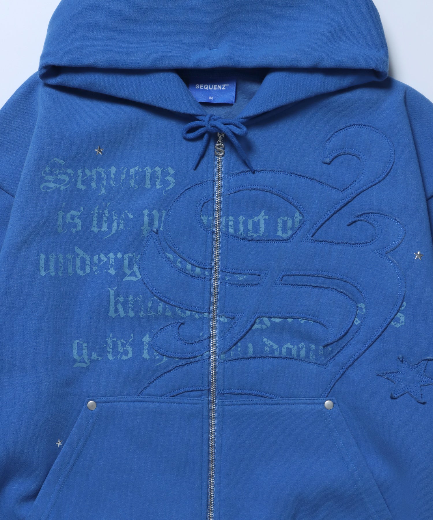 SQNZ ZIP P/K / ジップパーカー 裏起毛 フーディ スタッズ 加工 ワッペン プリント ブルー