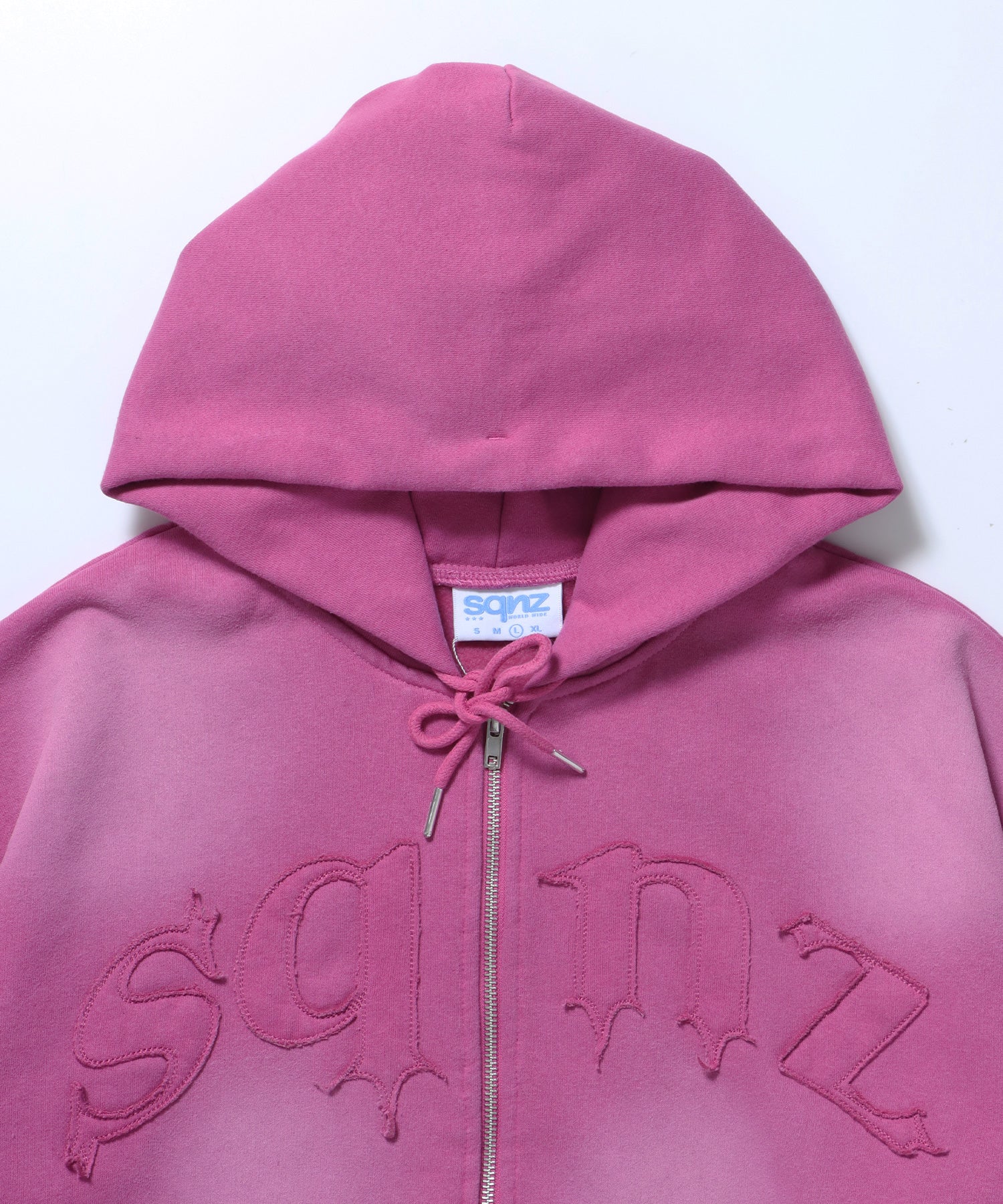 sqnz washed wappen zip p/k / フェード ジップパーカー スタッズ フルジップ オーバーサイズ ヴィンテージライク センターロゴ 裏起毛 ピンク