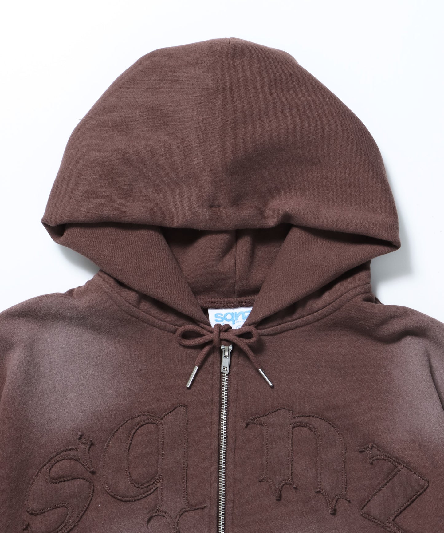 sqnz washed wappen zip p/k / フェード ジップパーカー スタッズ フルジップ オーバーサイズ ヴィンテージライク センターロゴ 裏起毛 ダークブラウン