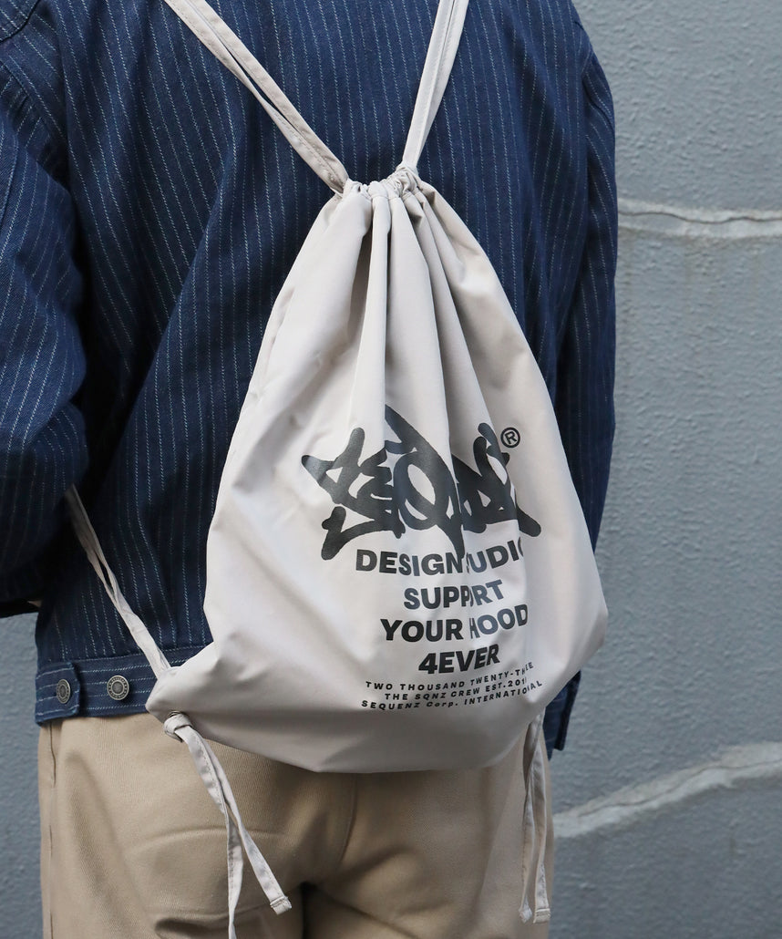 リバーシブルストリートナップサック / 2 FACE STRING KNAPSACK サンドベージュ