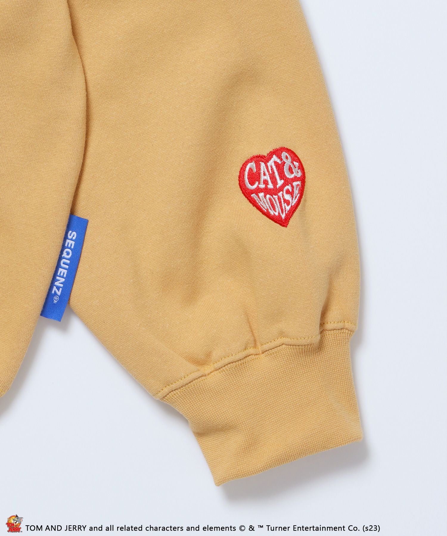 TOM and JERRY PEAR HALF ZIP POLO SWEAT / トムとジェリー ストリート 古着風 ロゴ ペアコーデ ハーフジップ プルオーバー キャメル