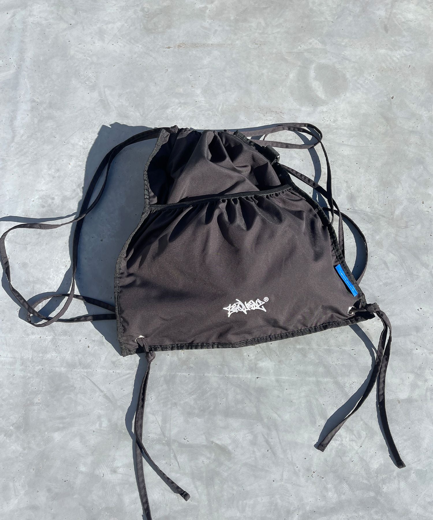 2 FACE STRING KNAPSACK / リバーシブル テック ナップサック ブランドロゴ ブラック