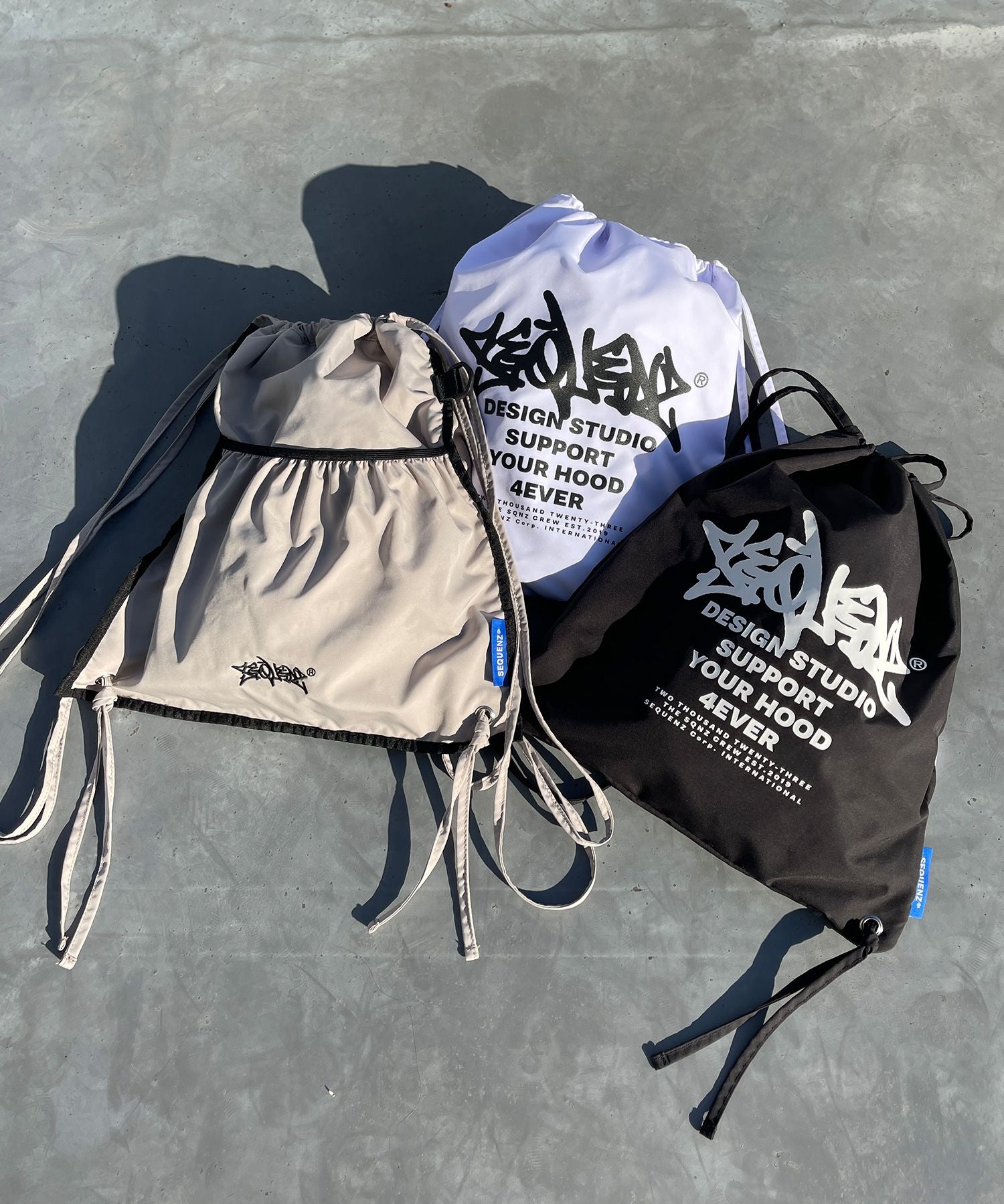 2 FACE STRING KNAPSACK / リバーシブル テック ナップサック ブランドロゴ ブラック