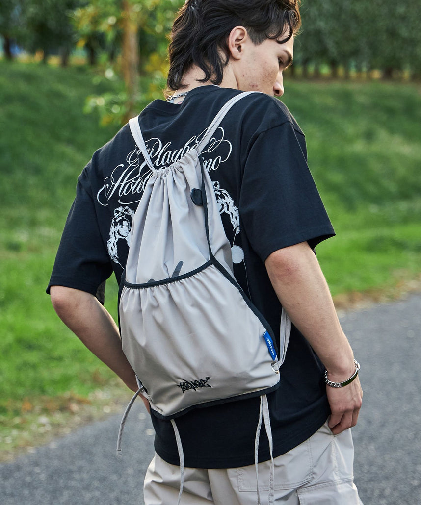 リバーシブルストリートナップサック / 2 FACE STRING KNAPSACK サンドベージュ