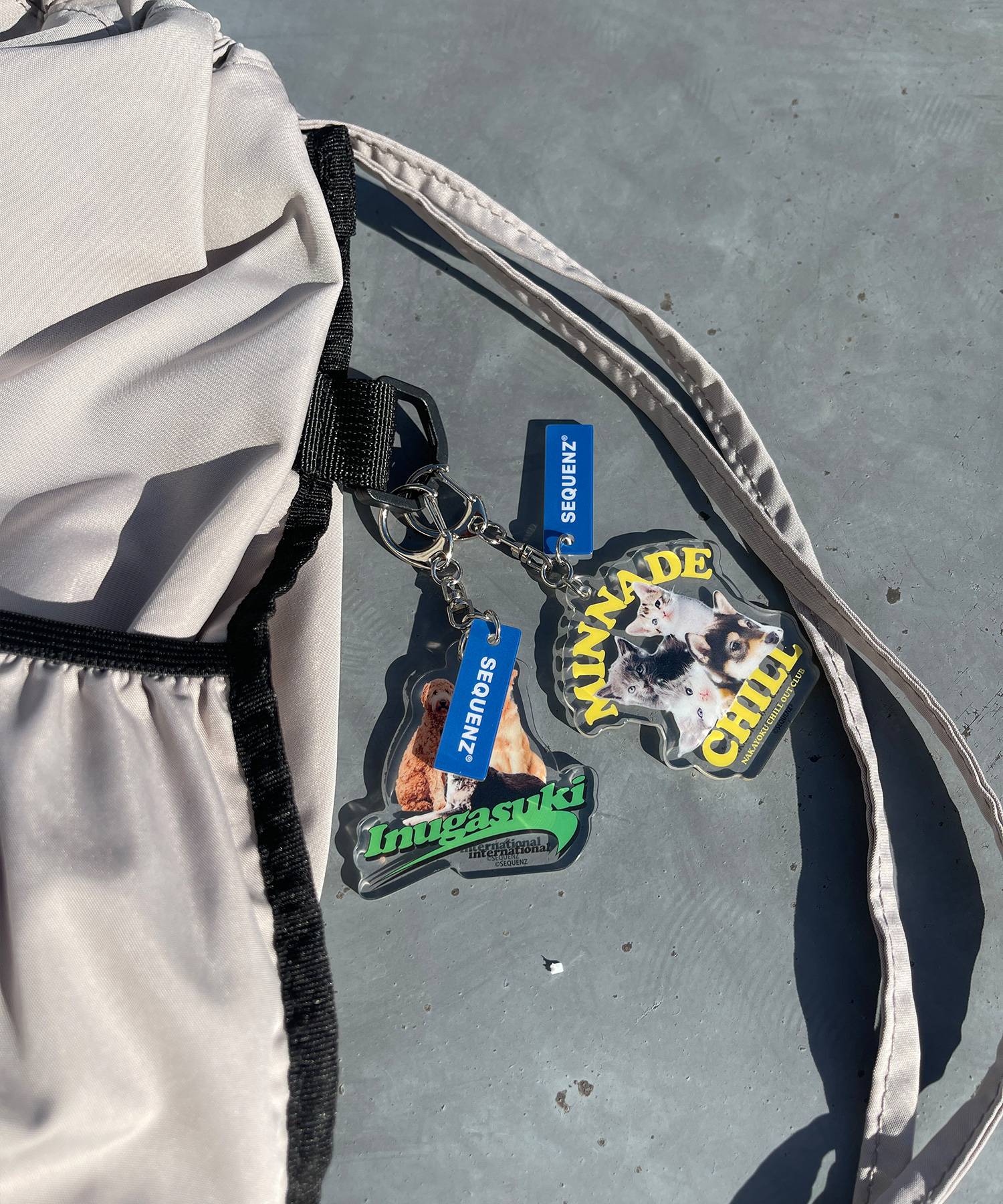 2 FACE STRING KNAPSACK / リバーシブル テック ナップサック ブランドロゴ サンドベージュ