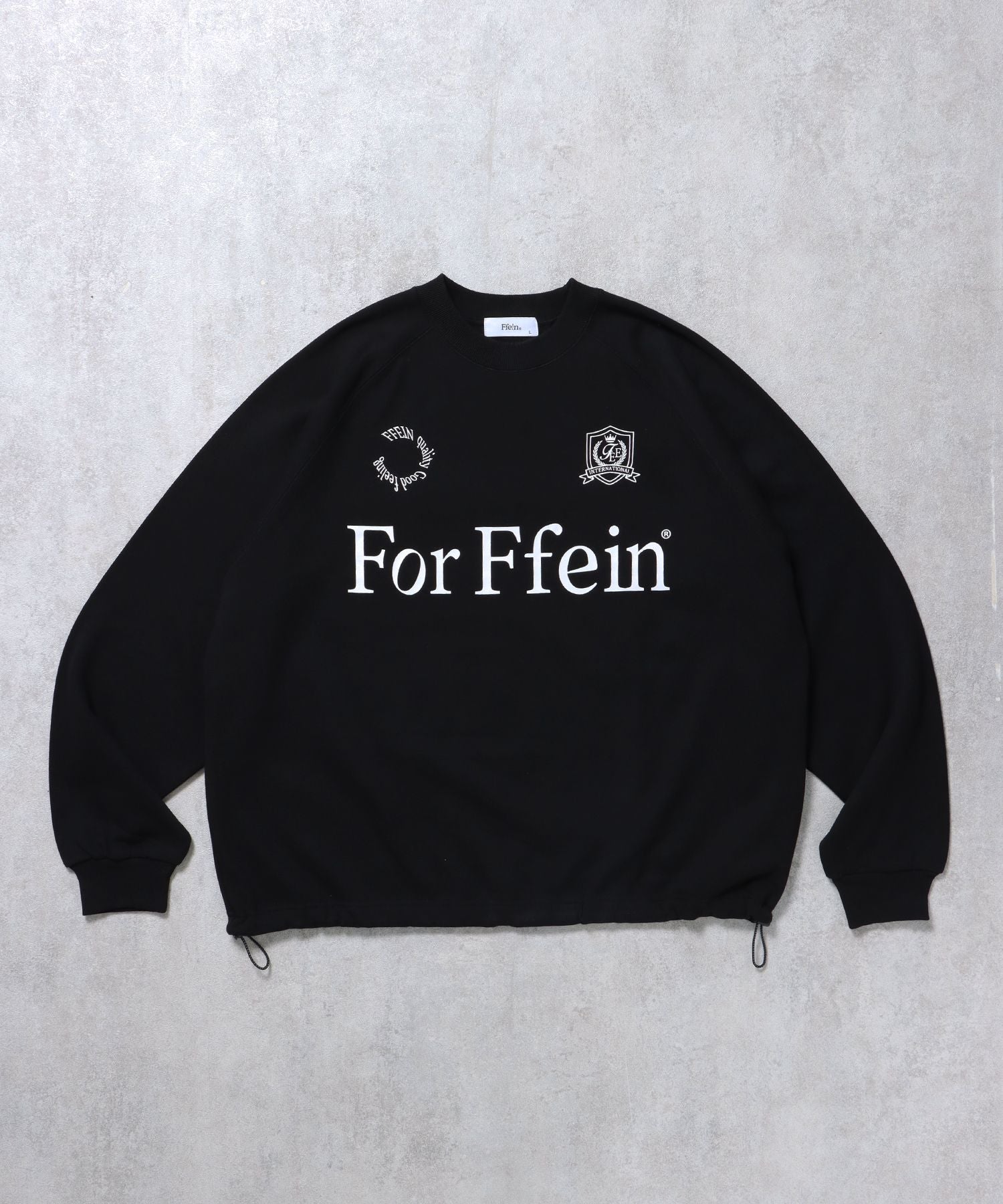 【FFEIN(フェイン)】ラグランプルオーバーゲームスウェット / シンプル ドローコード 裏起毛 オーバーサイズ ブランドロゴ ブラック