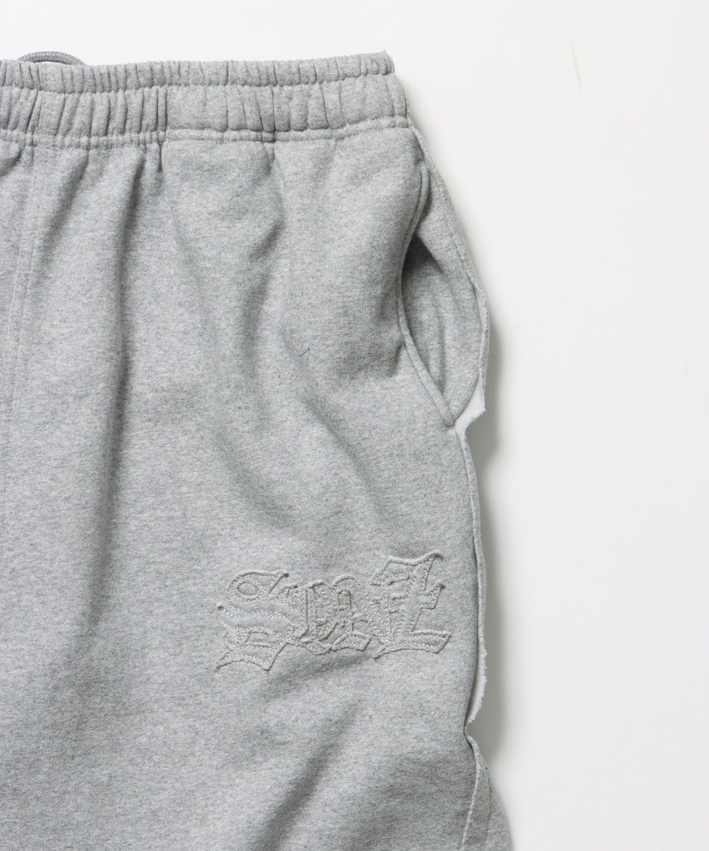 WASHED CURVE SWEAT PANTS / カーブ スウェットパンツ 加工 裏起毛 【セットアップ着用可】 グレー