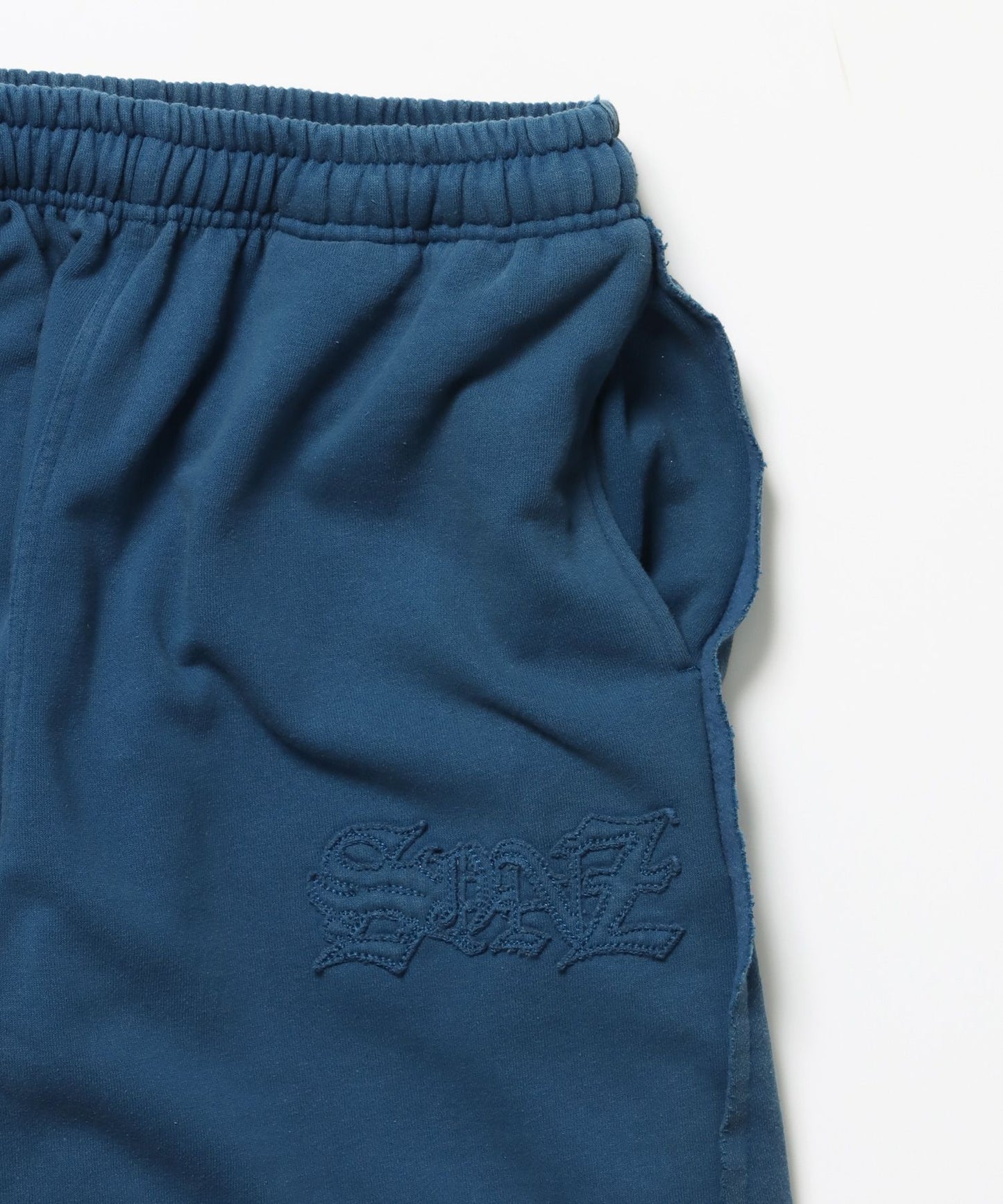 WASHED CURVE SWEAT PANTS / カーブ スウェットパンツ 加工 裏起毛 【セットアップ着用可】 ブルー