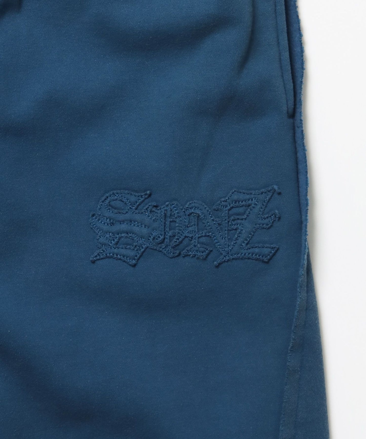 WASHED CURVE SWEAT PANTS / カーブ スウェットパンツ 加工 裏起毛 【セットアップ着用可】 ブルー