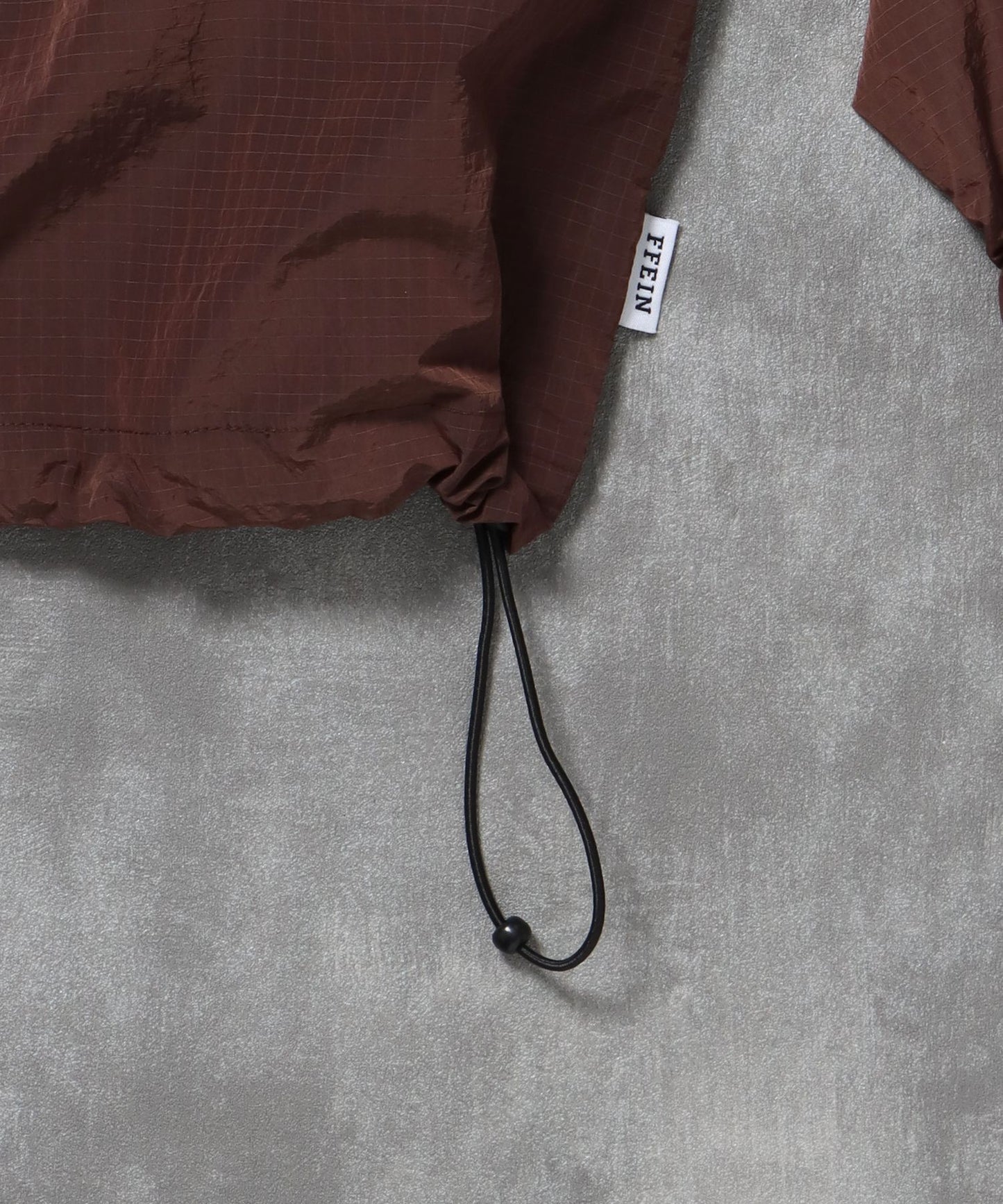 ナイロンチェックドローコードブルゾン / ポロシャツ ナイロン プリント ドローコード チェック ポケット ブラウン