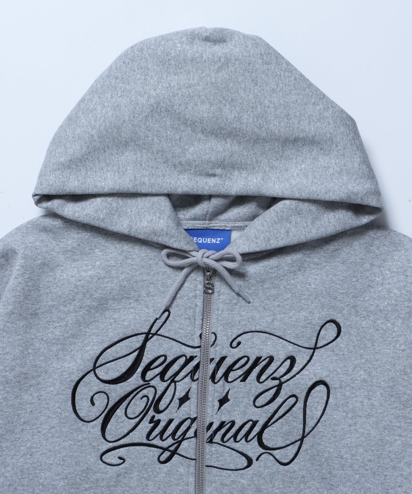 SQNZ LOGO GLITTER ZIP P/K / グリッター ジップパーカー ラメプリント ダブルジップ 裏起毛 【セットアップ着用可】 グレー