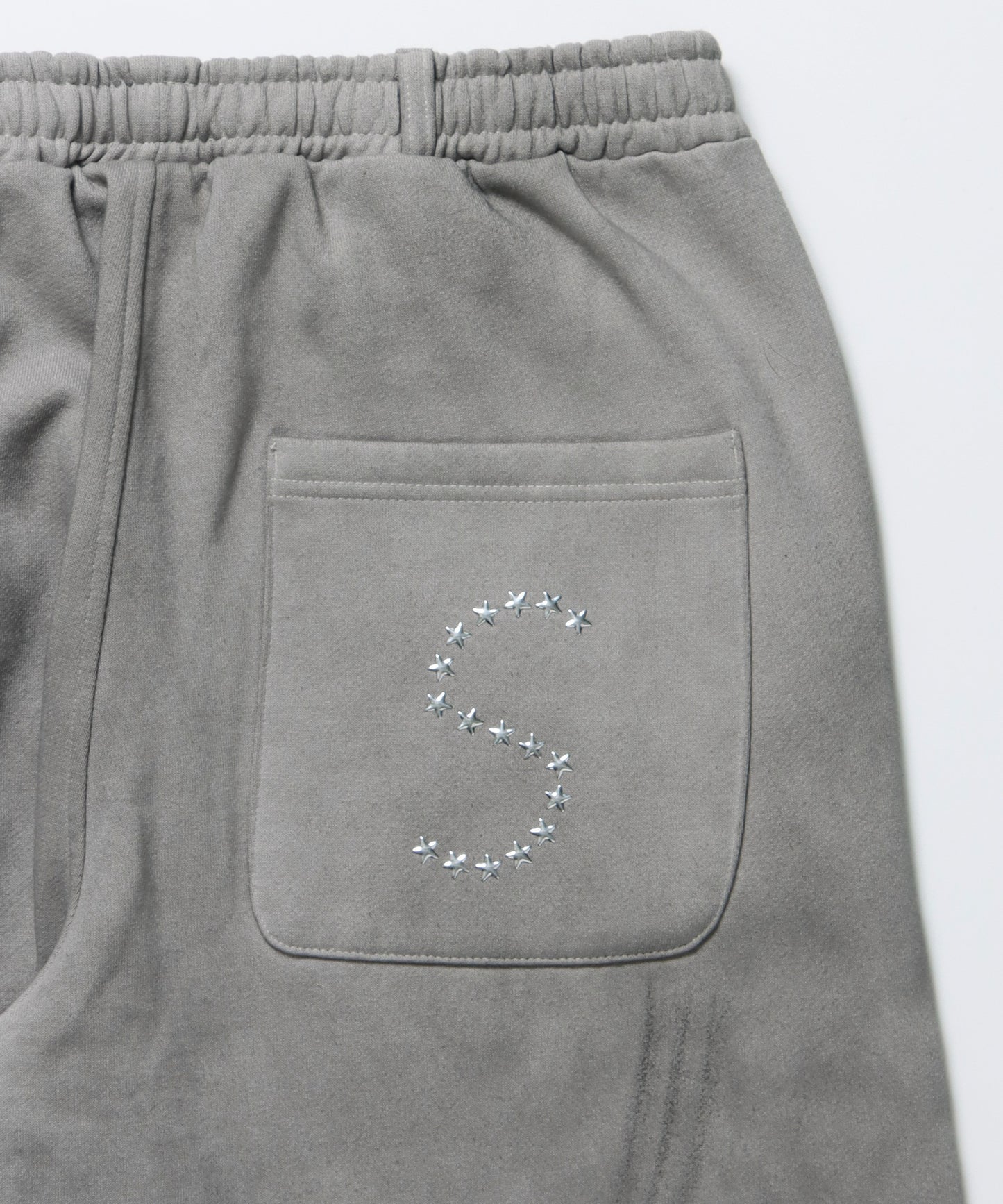 sqnz fade sweat pants / スウェット パンツ 加工 ハトメ スタッズ 裏起毛≪SET UP着用可能≫ ライトグレー