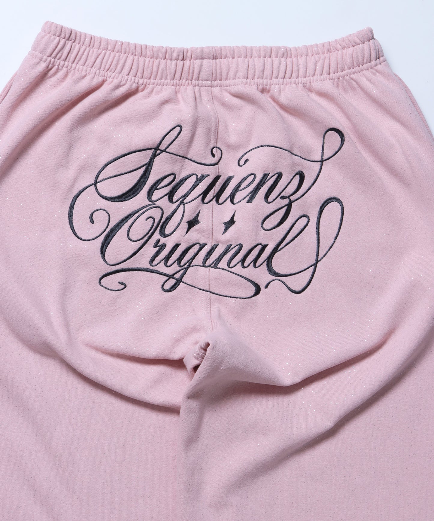 SQNZ GLITTER SWEAT PANTS / グリッター ラインストーン スウェットパンツ ドローコード 裏起毛 【セットアップ着用可】 ライトピンク