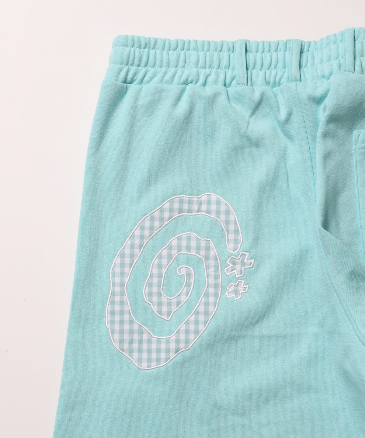 ※WEB限定 / ギンガムドットロゴスウェットパンツ / sqnzU spiral applique sweat pants