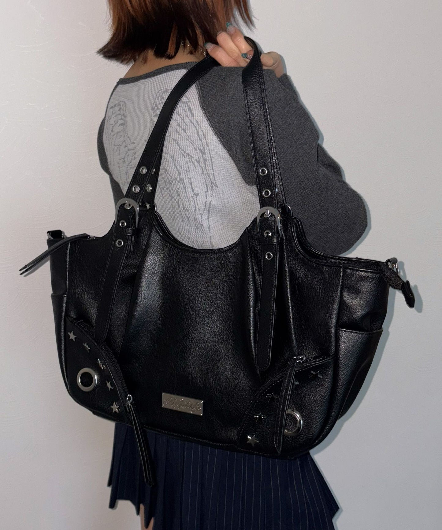 sqnz star eylet bag / フェイクレザー フェイクスウェード バック アジャスター ハンドバック ハトメ