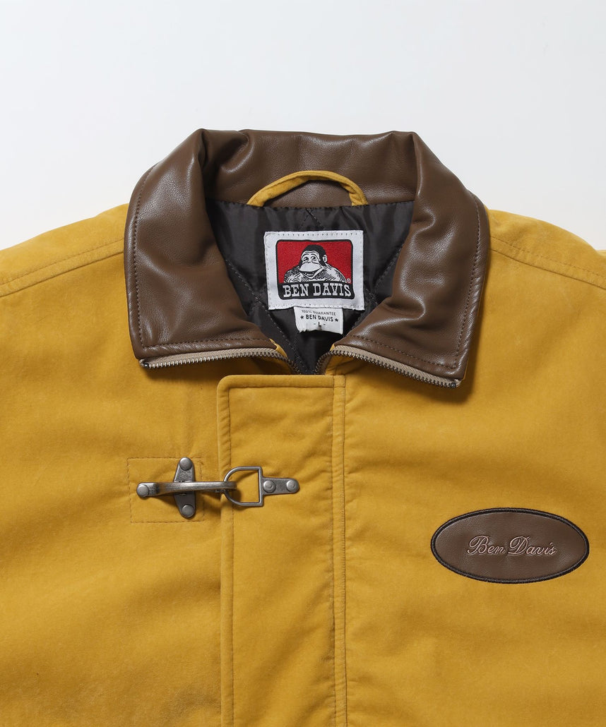 FAUX SUEDE RESCUE JACKET / レスキュージャケット フェイクスエード 中綿キルティング ハイネック ワッペン アウター ユニセックス マスタード