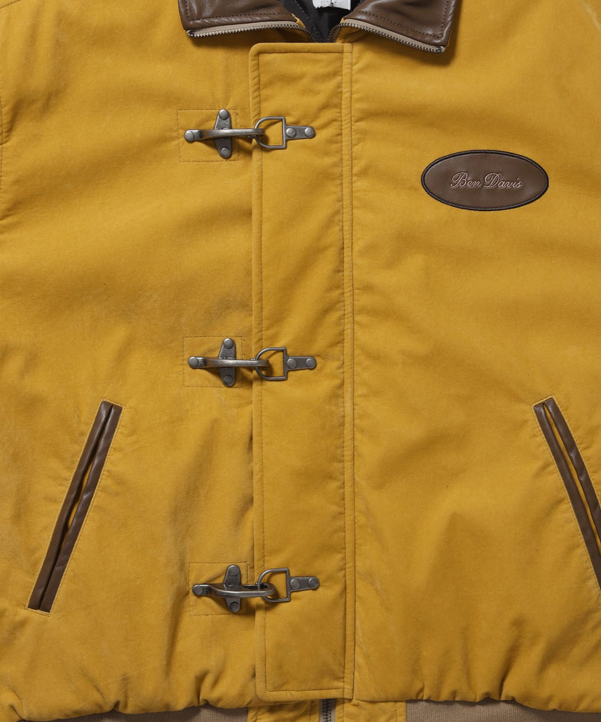 FAUX SUEDE RESCUE JACKET / レスキュージャケット フェイクスエード 中綿キルティング ハイネック ワッペン アウター ユニセックス マスタード