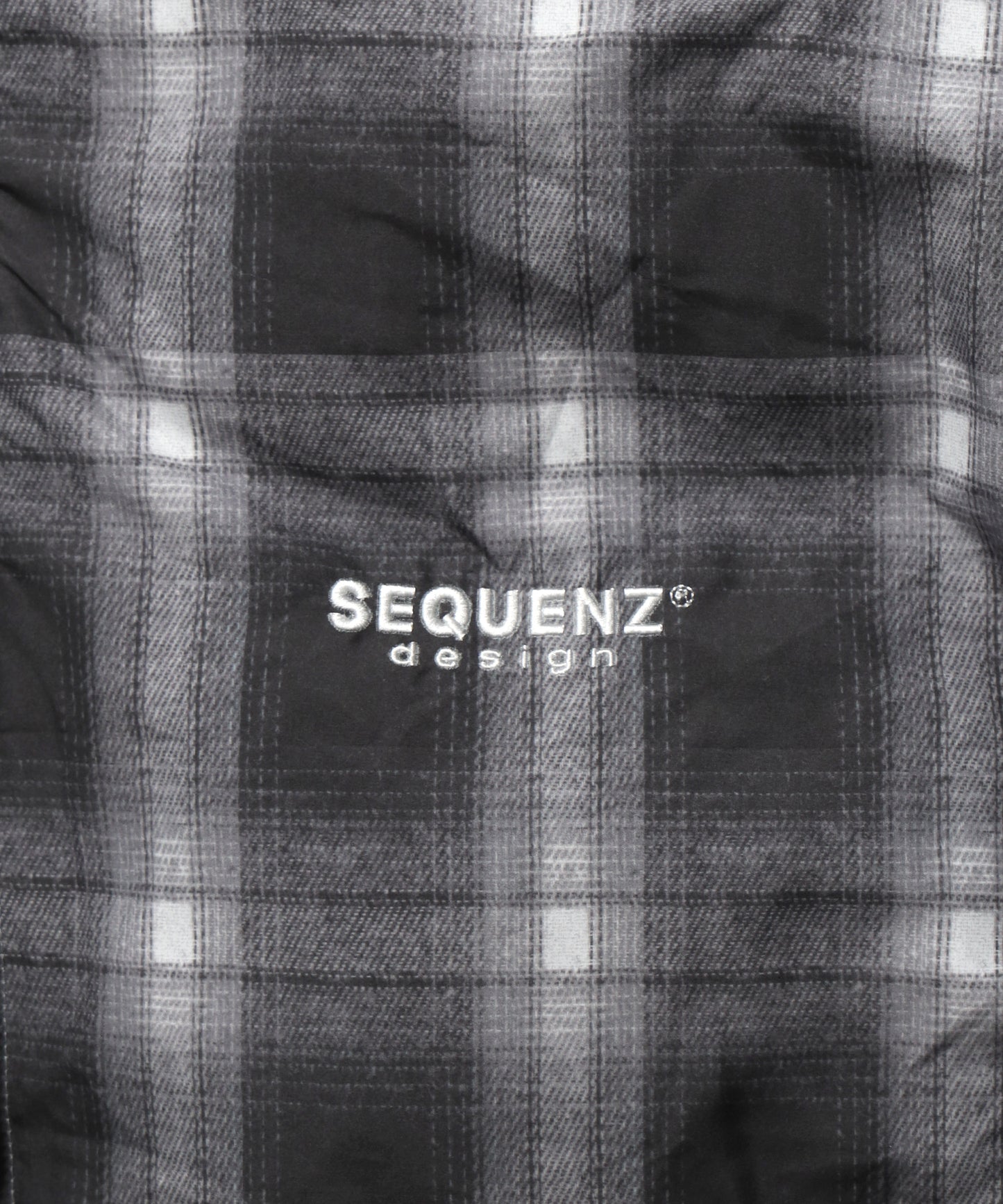 【SEQUENZ】 REVERSIBLE SYNTHETIC DOWN JACKET / リバーシブル ナイロン スタンド ダウンジャケット ドローコード OMBRE CHECK×L.GRAY